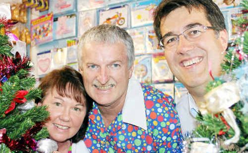 Rolly’s Party and Lolly Shop’s Kerol and Pat Dunne with Warwick Red Cross president Neil Meiklejohn. Rolly’s Party and Lolly Shop’s Kerol and Pat Dunne with Warwick Red Cross president Neil Meiklejohn.